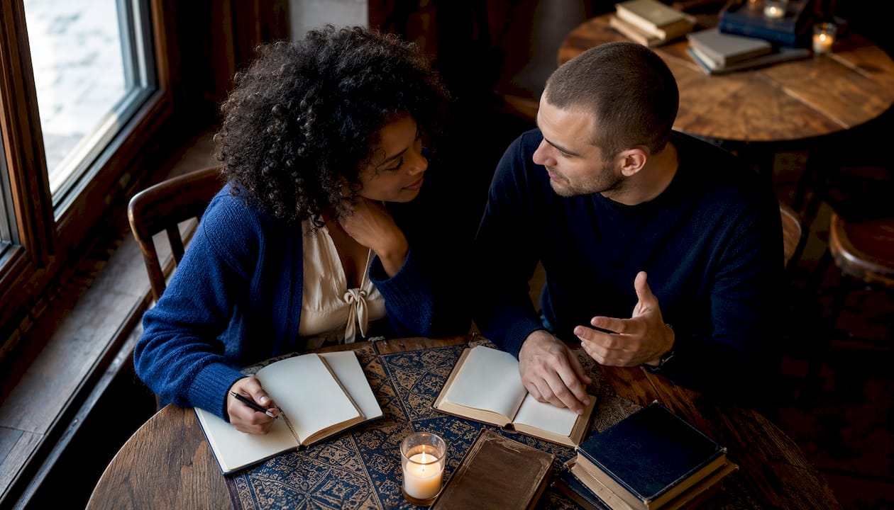 Mixed couple engaging in communication counseling session